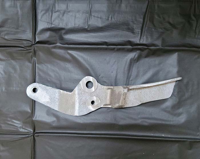 Aluminum casting for the upper end of a top rail